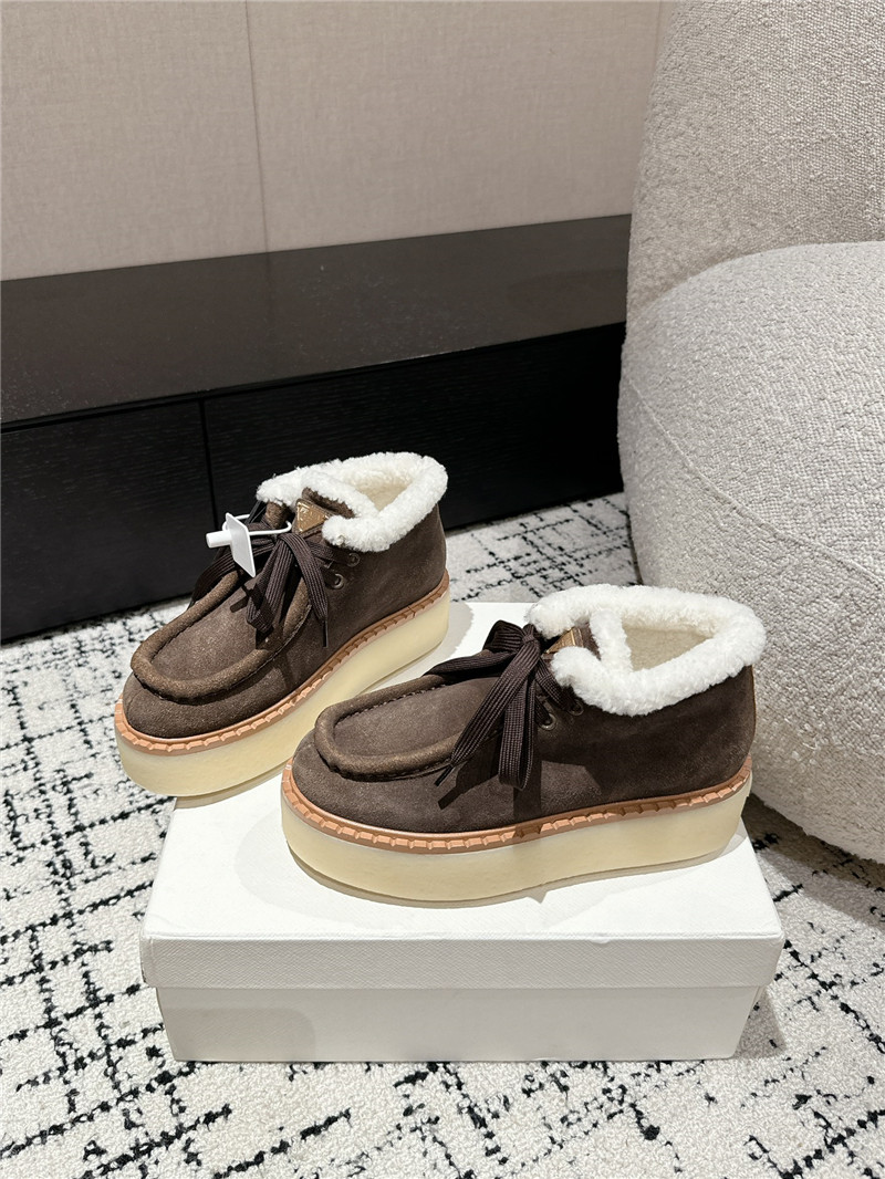 Pra*a brown suede shearling platform ankle boots