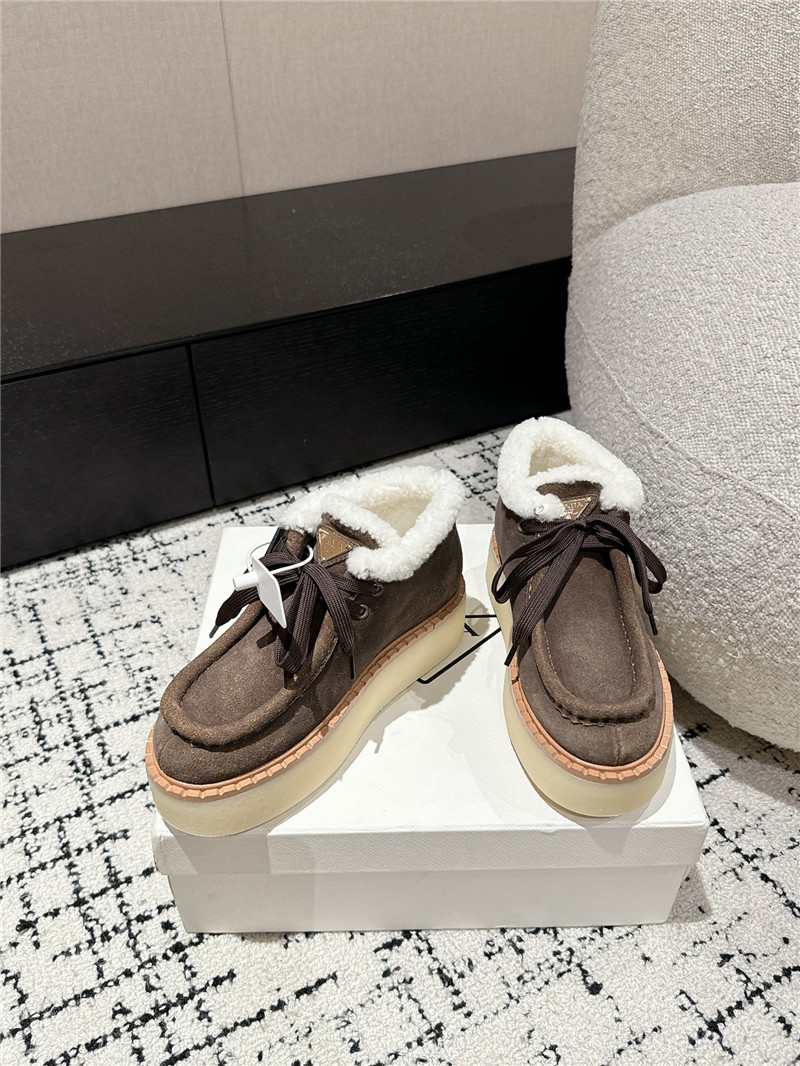 Pra*a brown suede shearling platform ankle boots