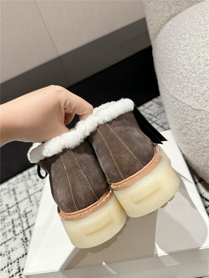 Pra*a brown suede shearling platform ankle boots