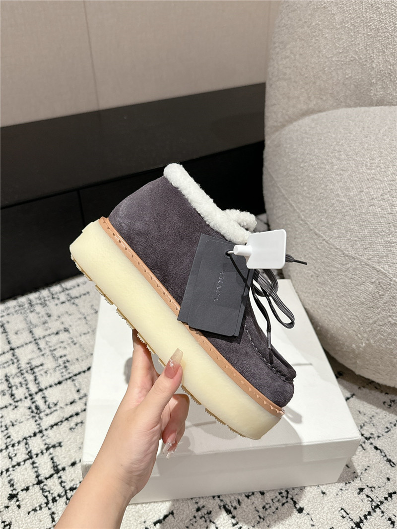 Pra*a gray suede shearling platform ankle boots