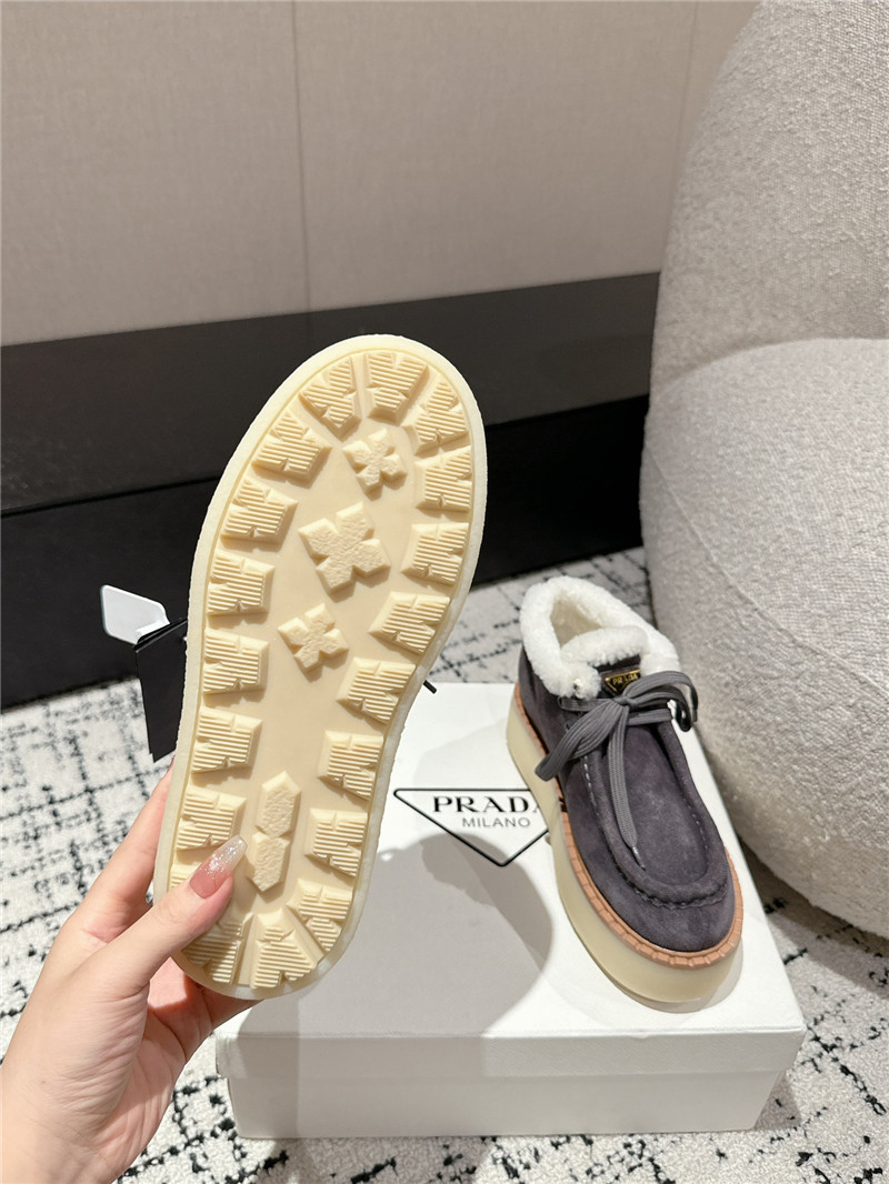 Pra*a gray suede shearling platform ankle boots