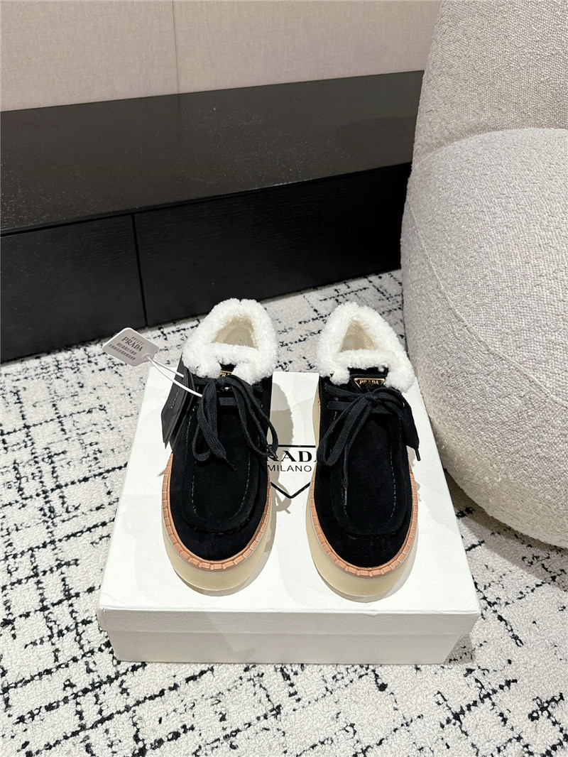 Pra*a suede shearling platform ankle boots