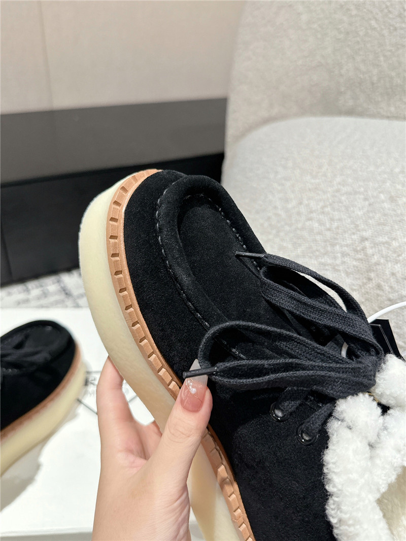 Pra*a suede shearling platform ankle boots