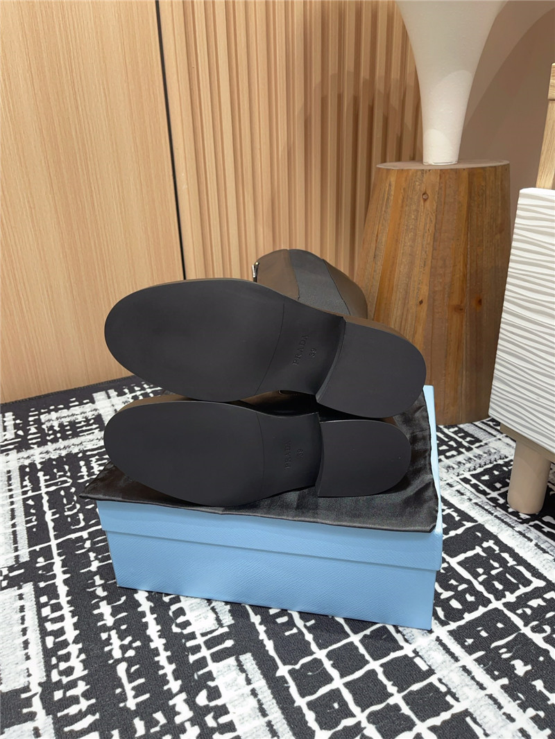 Pra*a logo leather chelsea knee-high boots