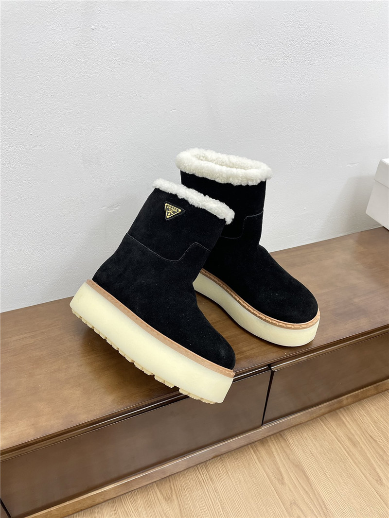 Pra*a triangle-logo platform black suede boots