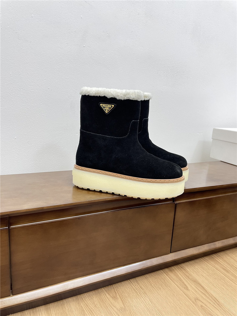 Pra*a triangle-logo platform black suede boots