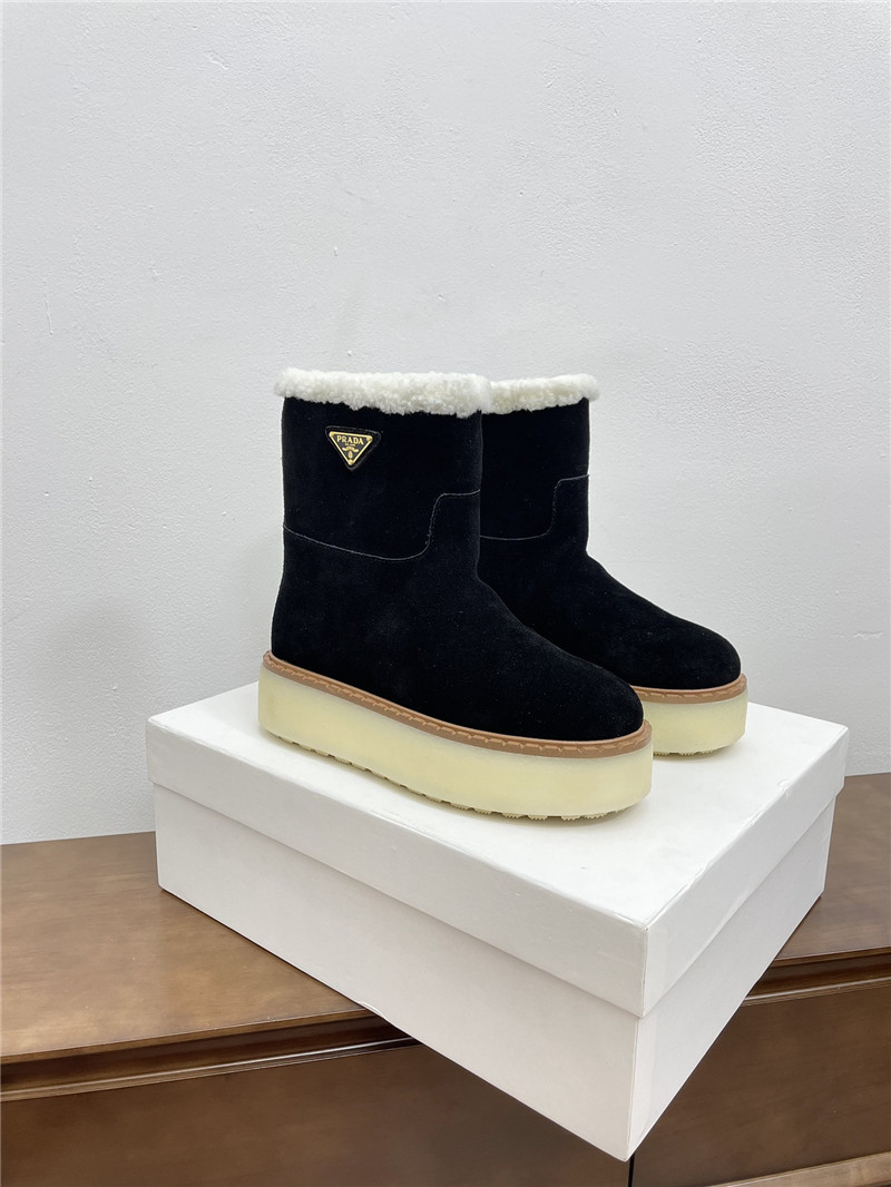 Pra*a triangle-logo platform black suede boots