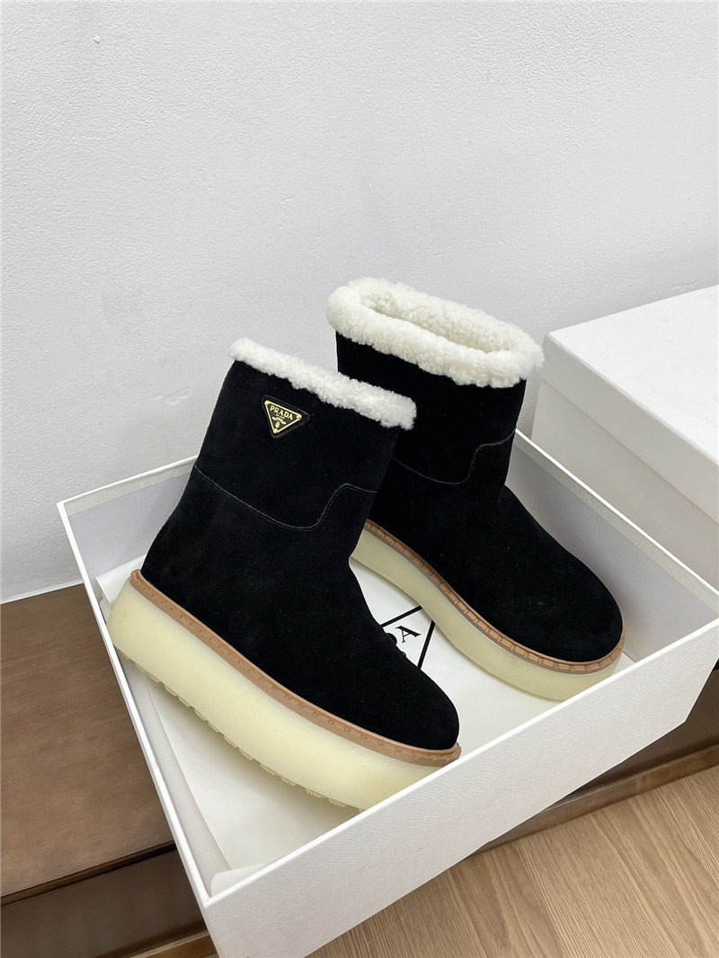 Pra*a triangle-logo platform black suede boots