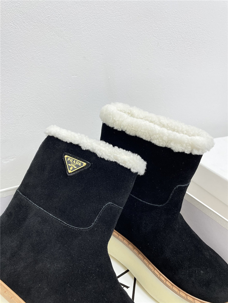 Pra*a triangle-logo platform black suede boots