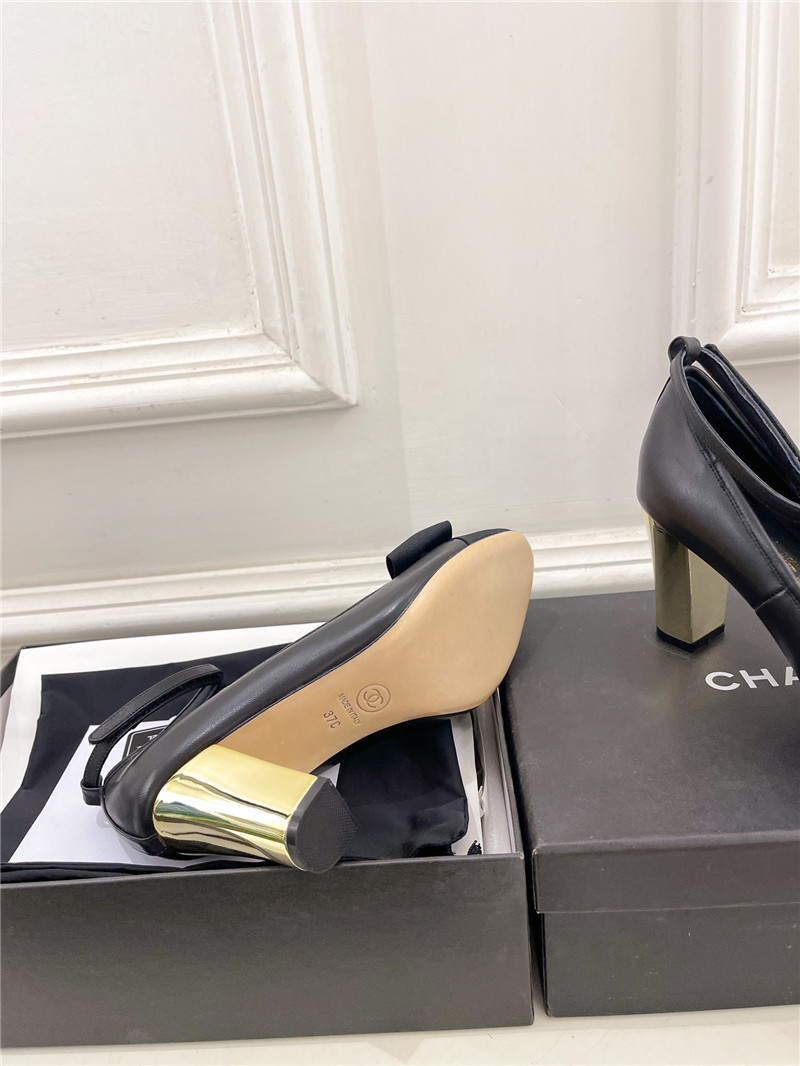 Ch**el bow mary jane heel pumps in black calfskin