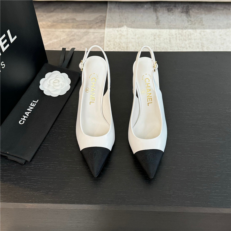 Ch**el pointed heel slingbacks in ivory/black calfskin