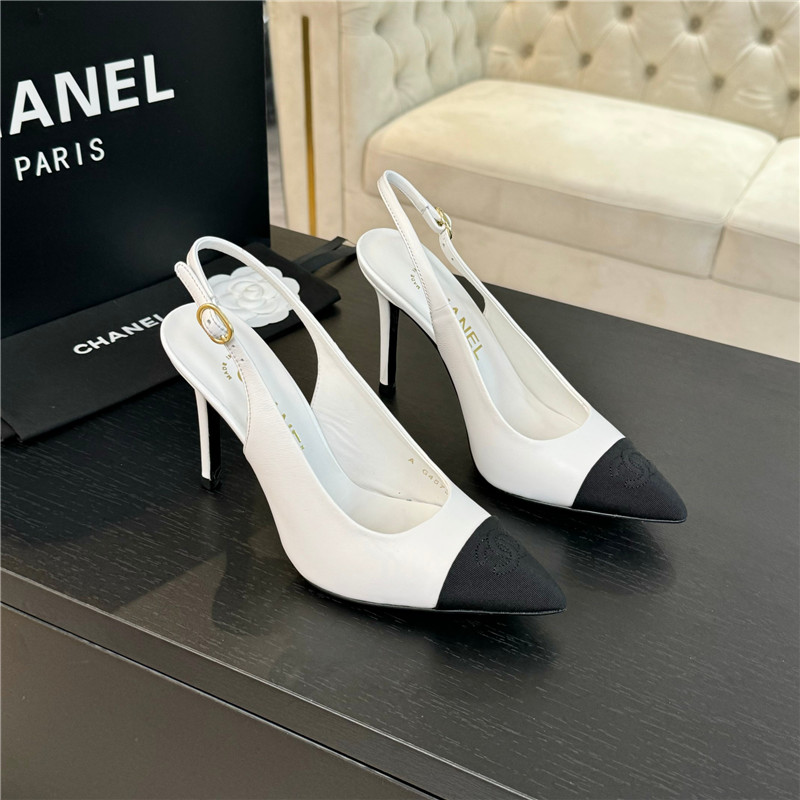 Ch**el pointed heel slingbacks in ivory/black calfskin