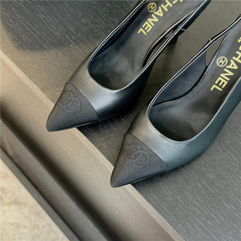 Ch**el pointed heel slingbacks in black leather/grosgrain
