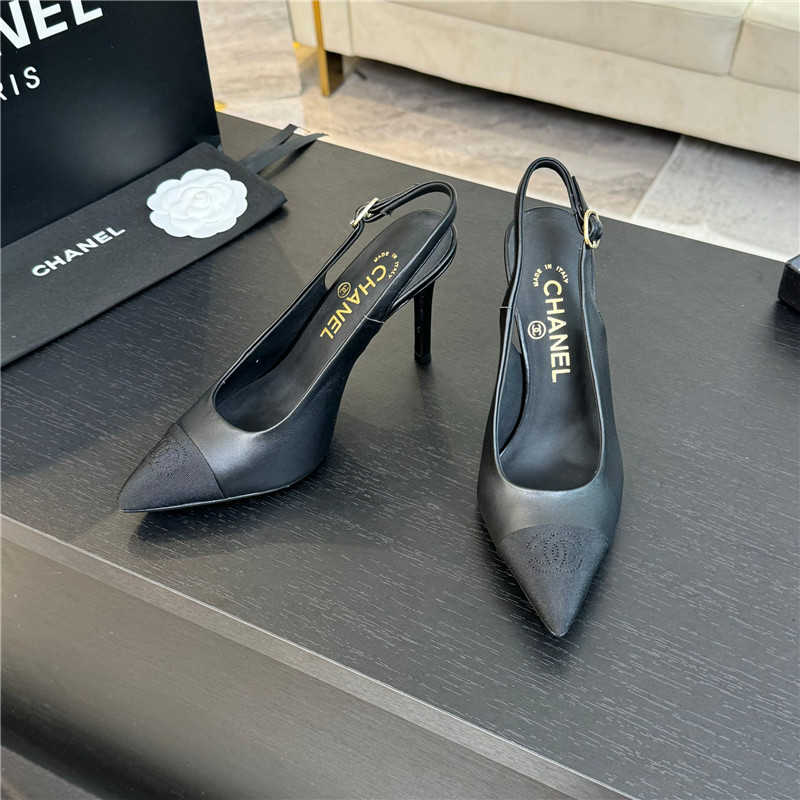 Ch**el pointed heel slingbacks in black leather/grosgrain