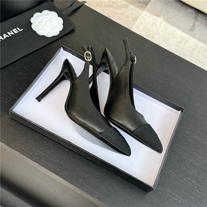 Ch**el pointed heel slingbacks in black leather/grosgrain