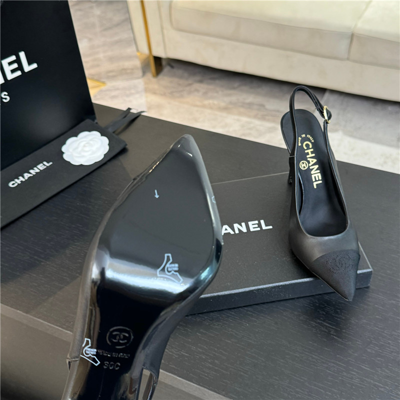 Ch**el pointed heel slingbacks in black leather/grosgrain