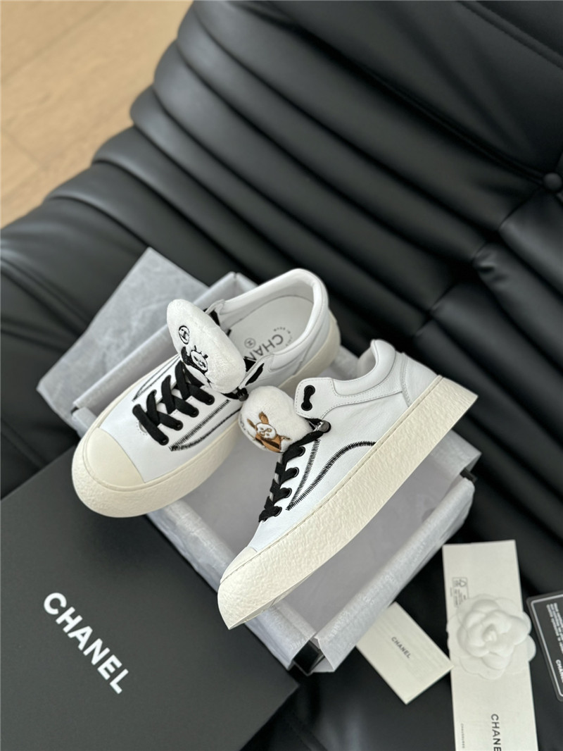 Ch**el white lace-up low top sneakers