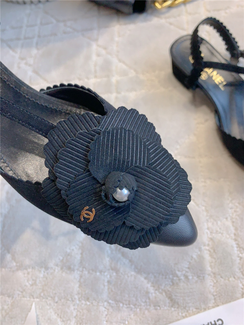 Ch**el camellia slingback flats in black suede leather