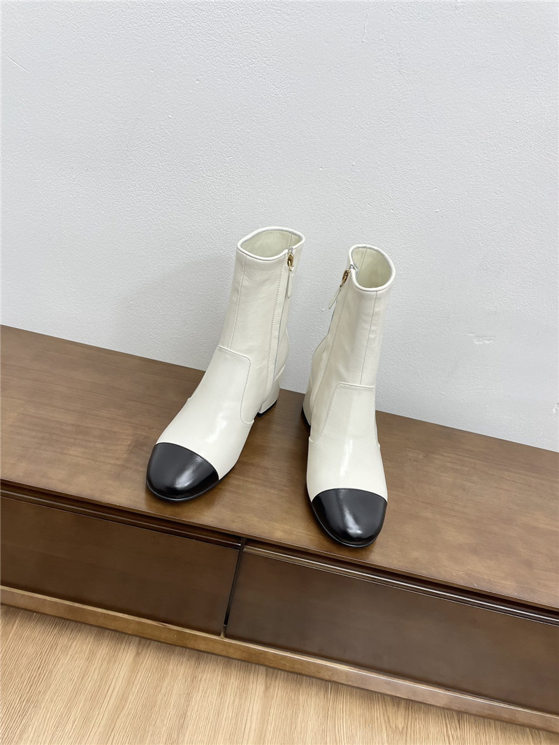 Ch**el calfskin block heel round toe ankle boots