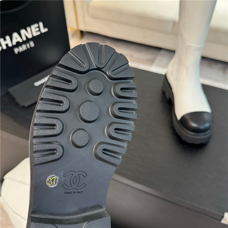 Ch**el white knee-high leather boots