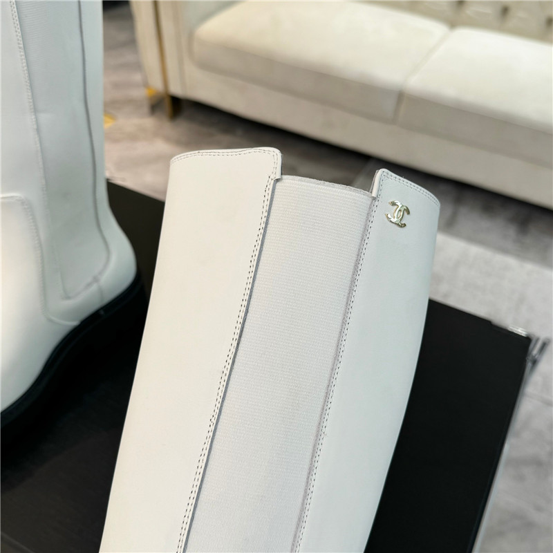 Ch**el white knee-high leather boots