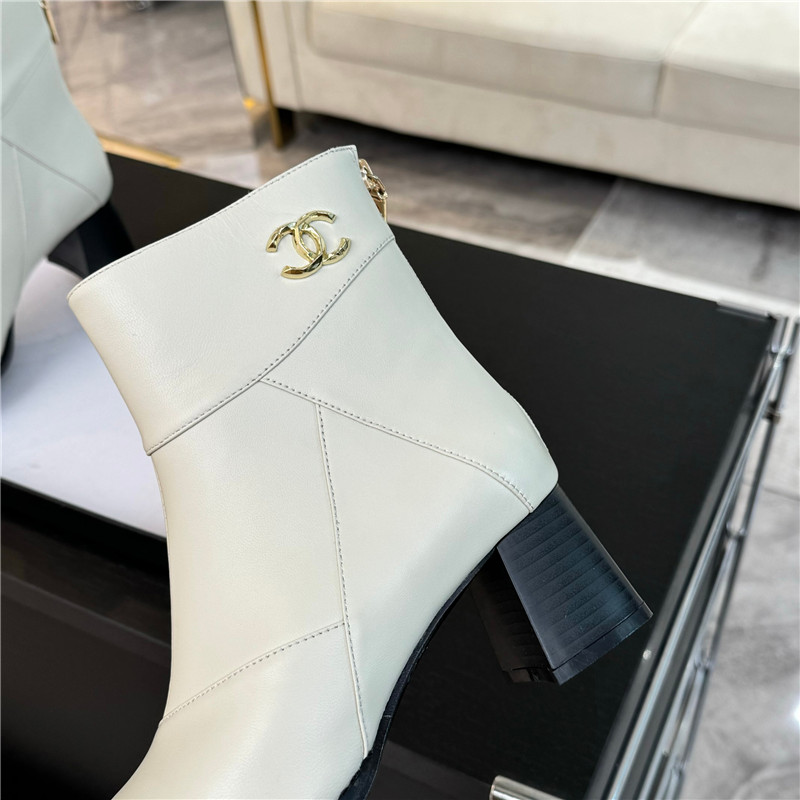 Ch**el block heel pointed toe calfskin ankle boots