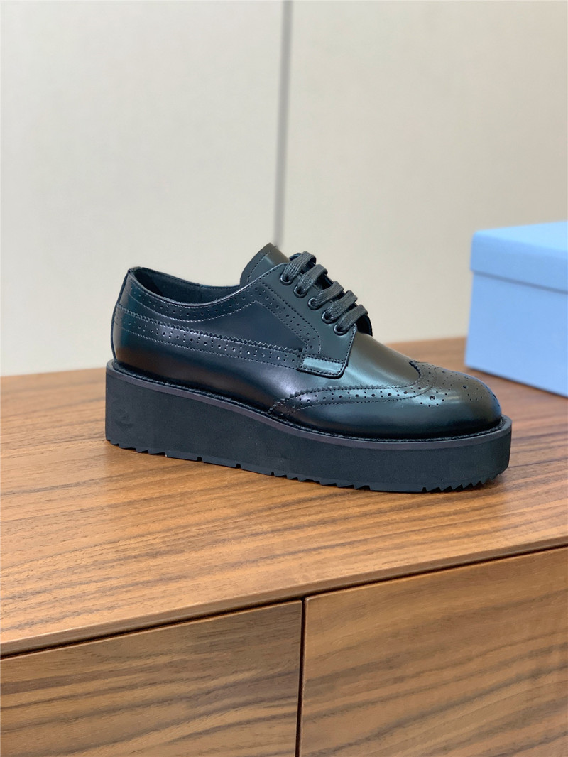 Pra*a black brushed leather derby brogue shoes