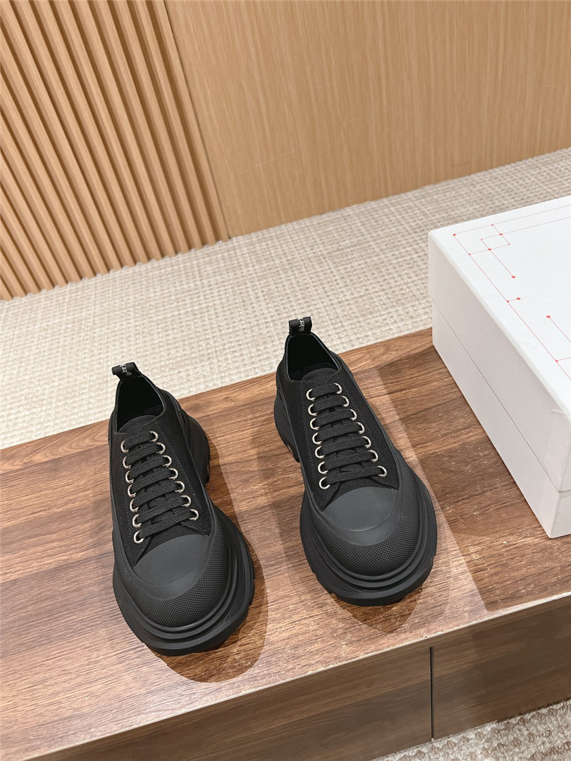 a1exa*der Mcqv*en black tread slick low top sneakers