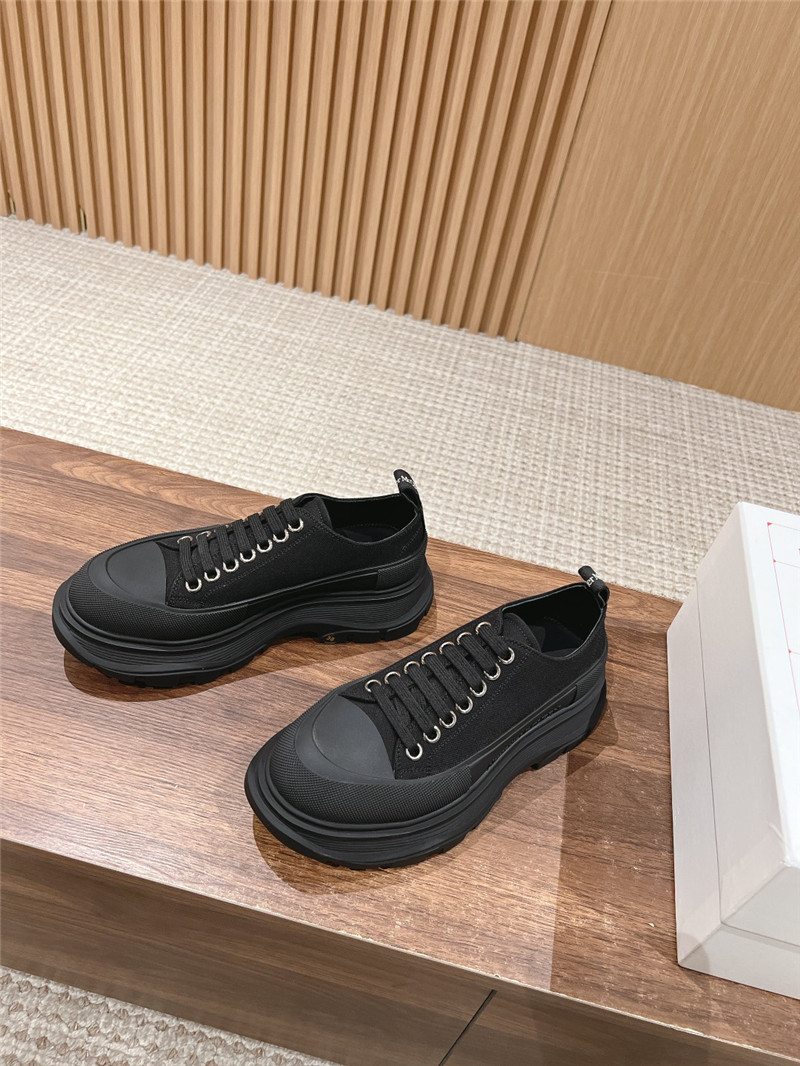 a1exa*der Mcqv*en black tread slick low top sneakers