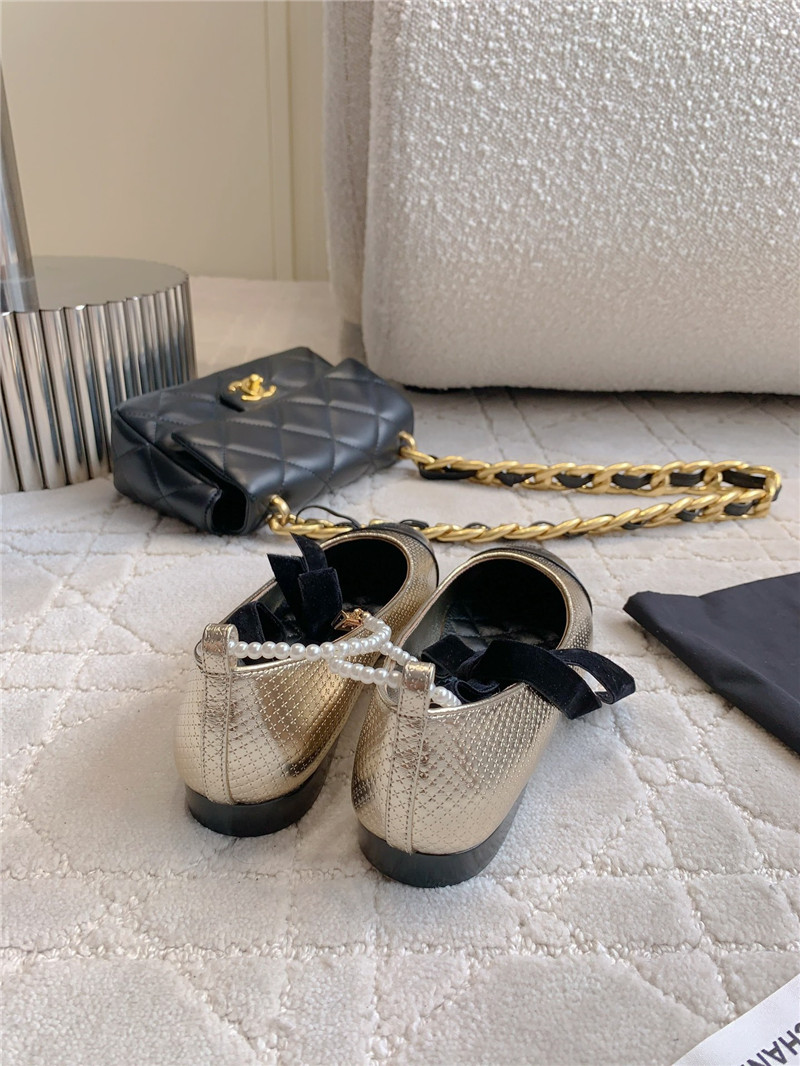 Ch**el mary janes gold/black anklet flats