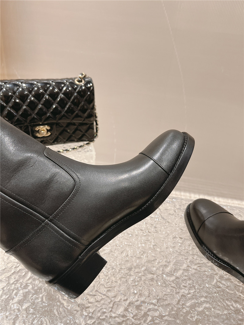 Ch**el black calfskin rider ankle boots