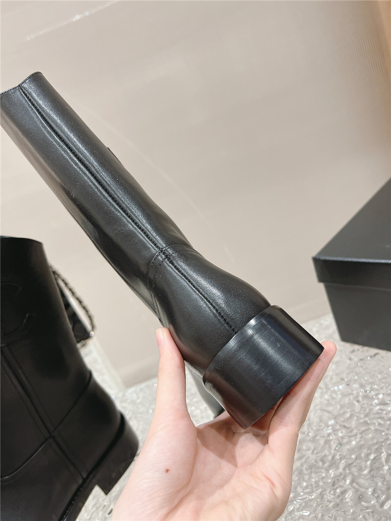 Ch**el black calfskin rider ankle boots