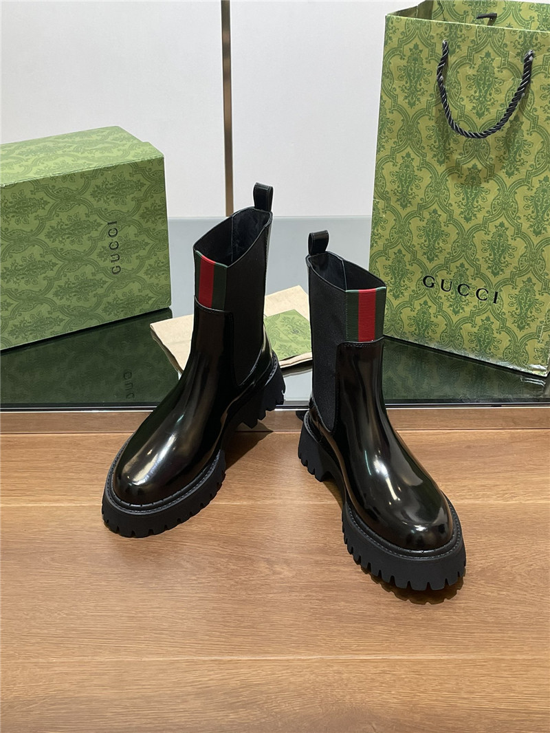 Gvc*1 women’s black patent leather boot with web