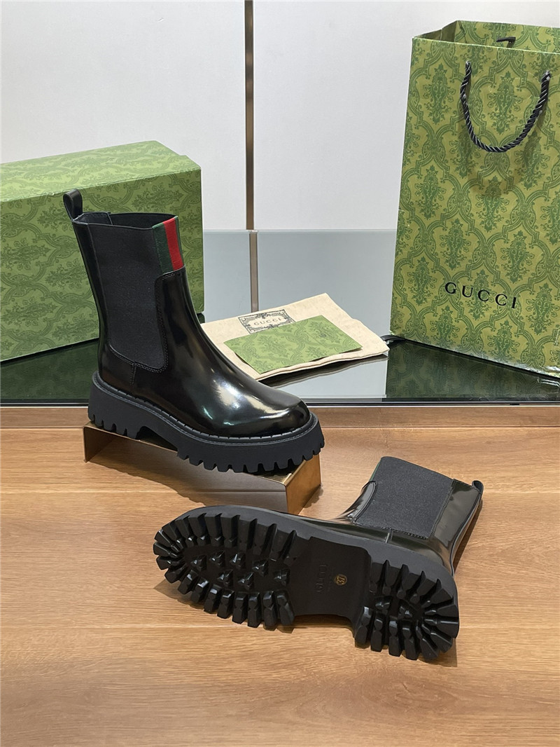 Gvc*1 women’s black patent leather boot with web