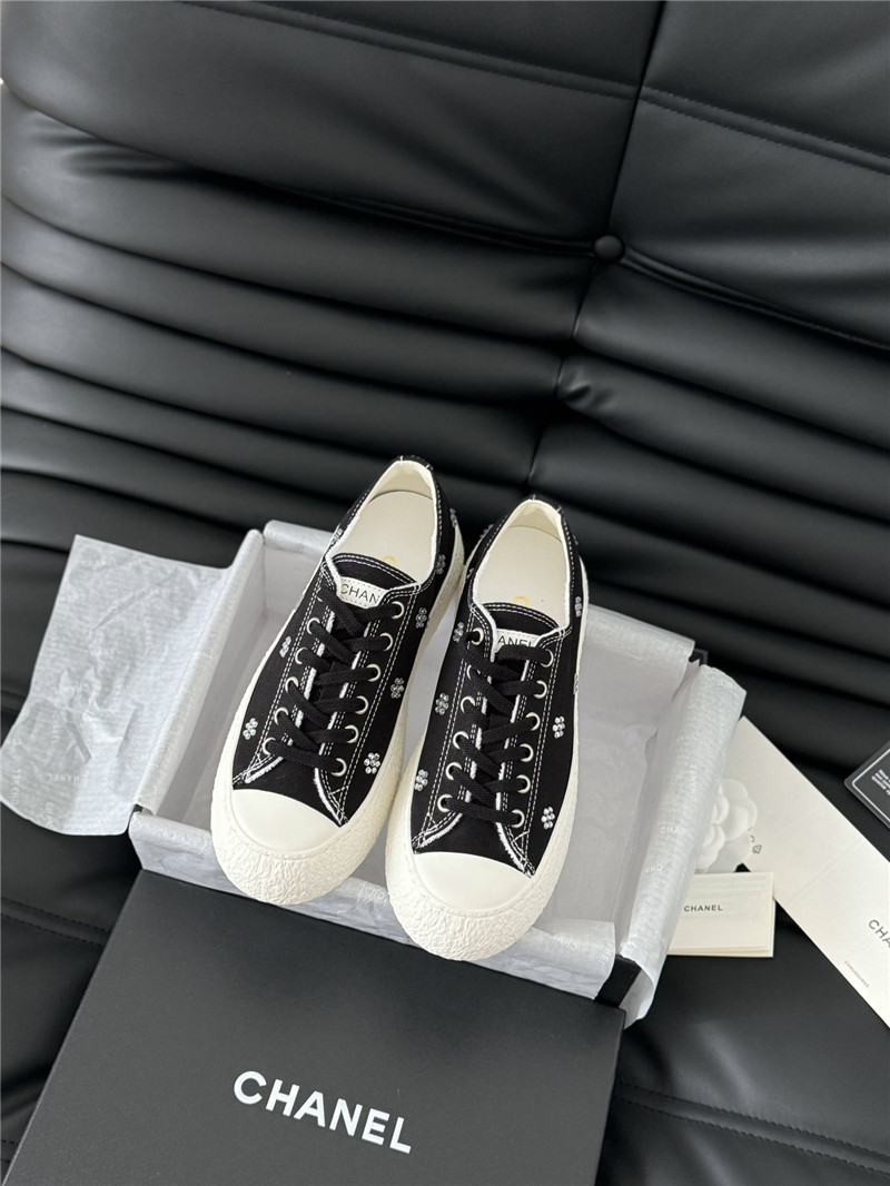 Ch**el black lace-up low top canvas sneakers