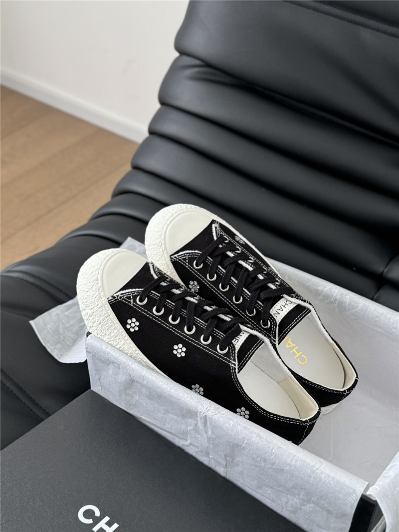 Ch**el black lace-up low top canvas sneakers