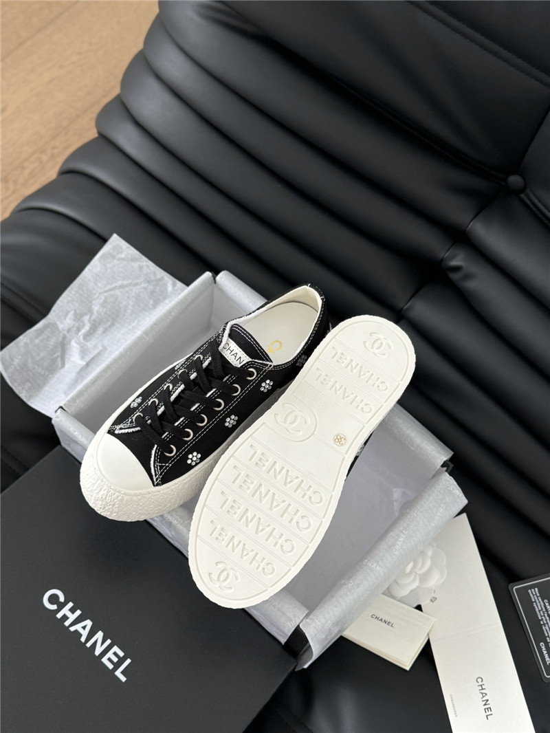 Ch**el black lace-up low top canvas sneakers