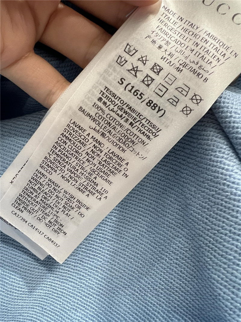 Gvc*1 motif terry cotton sweatshirt in blue