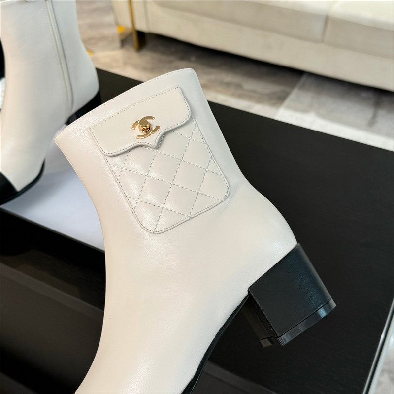 Ch**el calfskin cap toe ankle boots in white