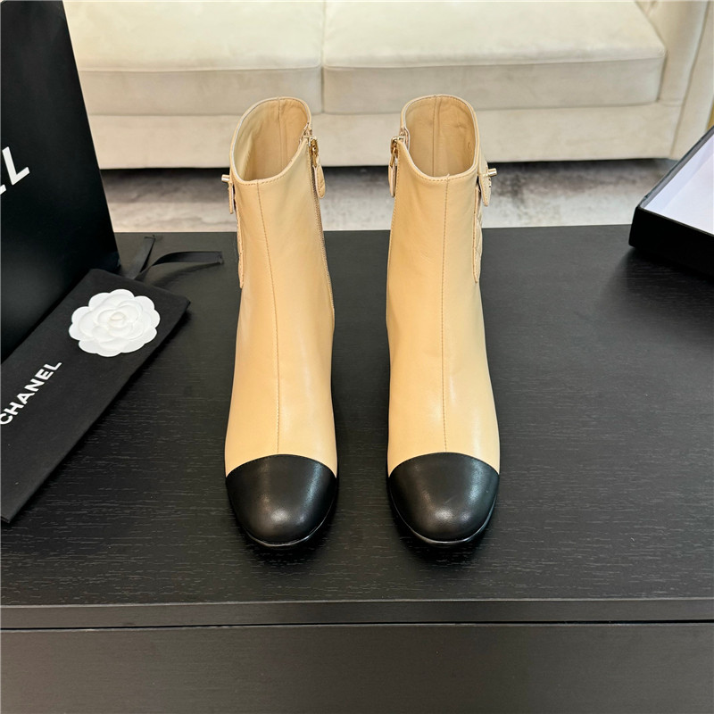 Ch**el brown calfskin cap toe ankle boots