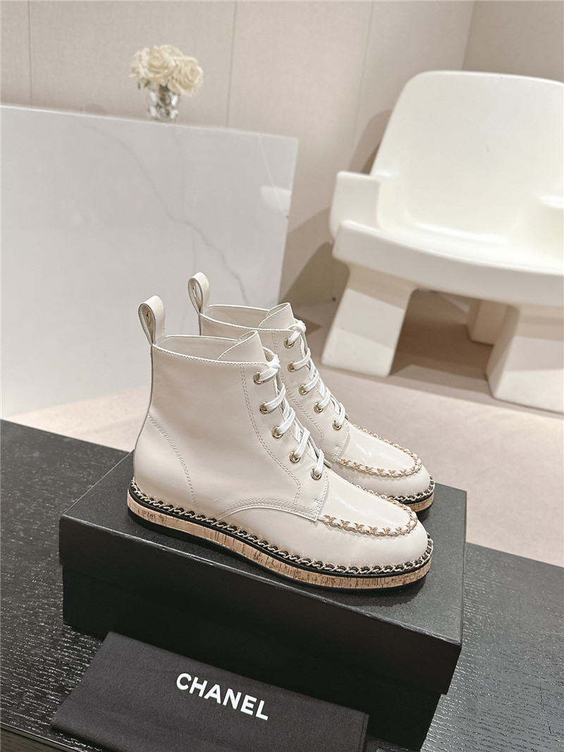 Ch**el lace-up calfskin flat ankle boots in white