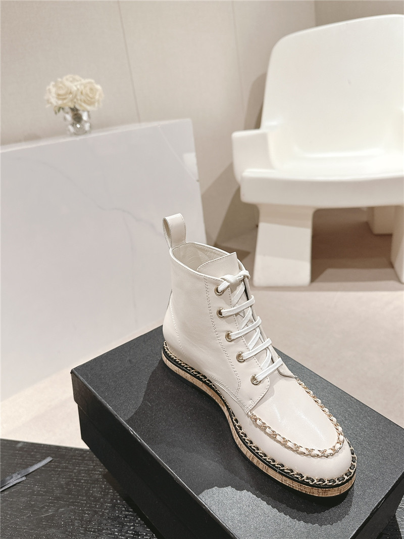 Ch**el lace-up calfskin flat ankle boots in white