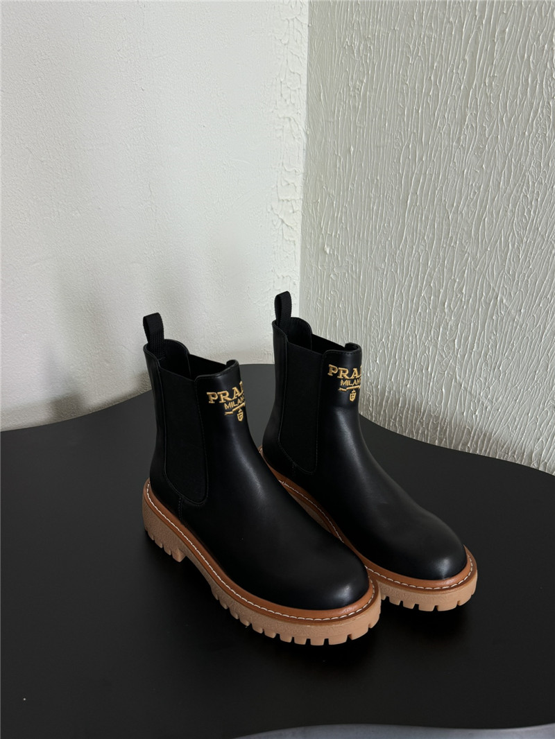 Pra*a embroidered logo chelsea boots