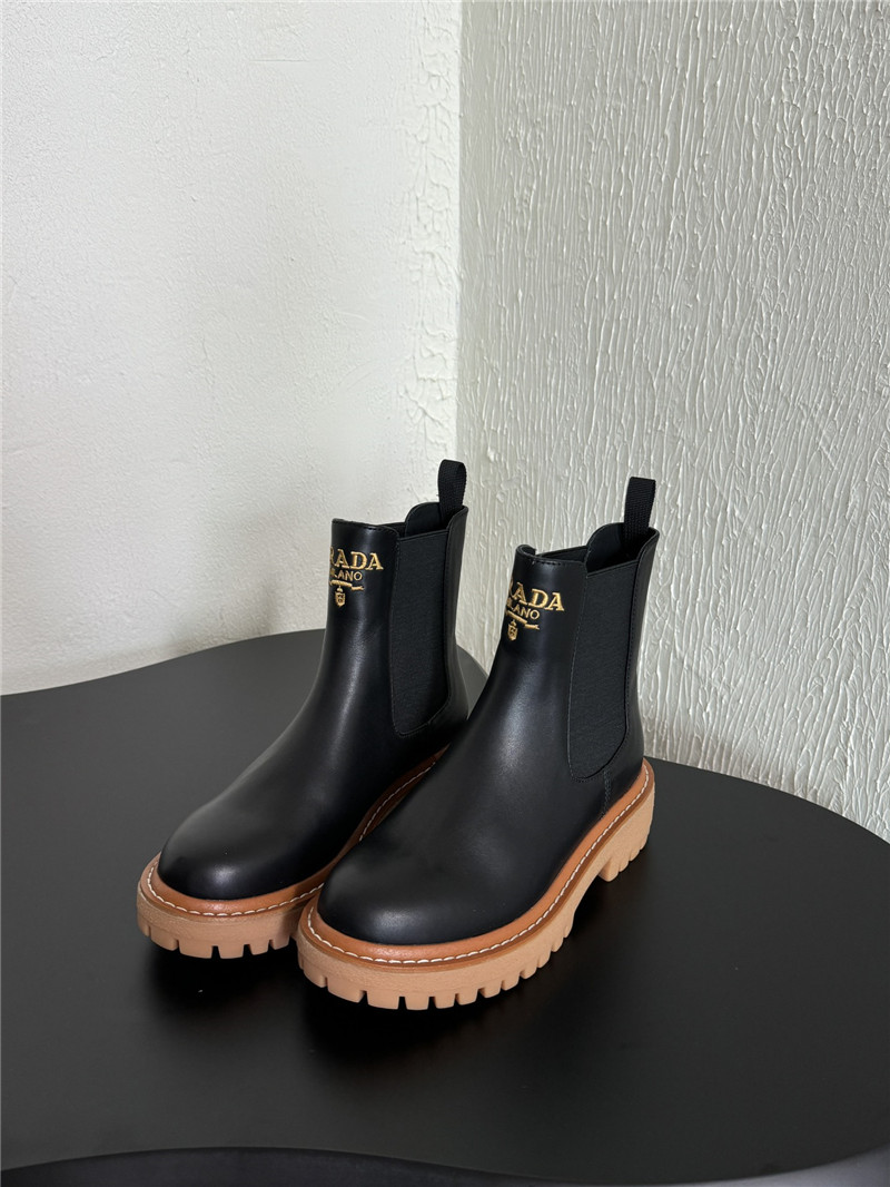Pra*a embroidered logo chelsea boots