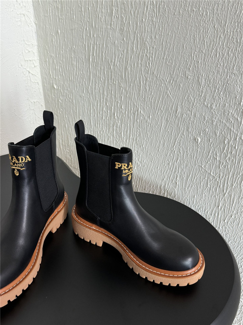 Pra*a embroidered logo chelsea boots