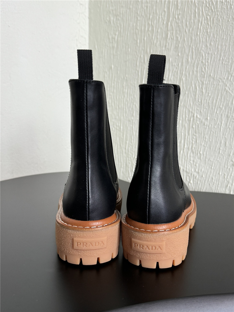 Pra*a embroidered logo chelsea boots