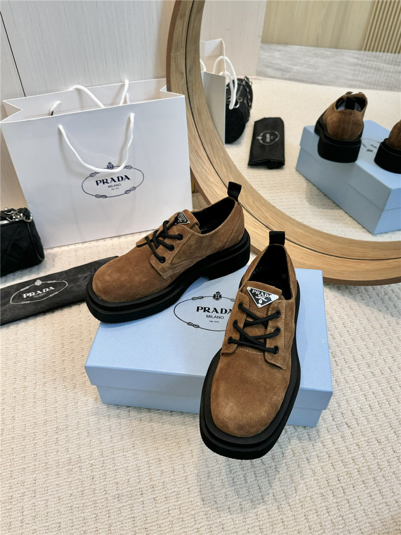 Pra*a suede leather triangle logo loafers