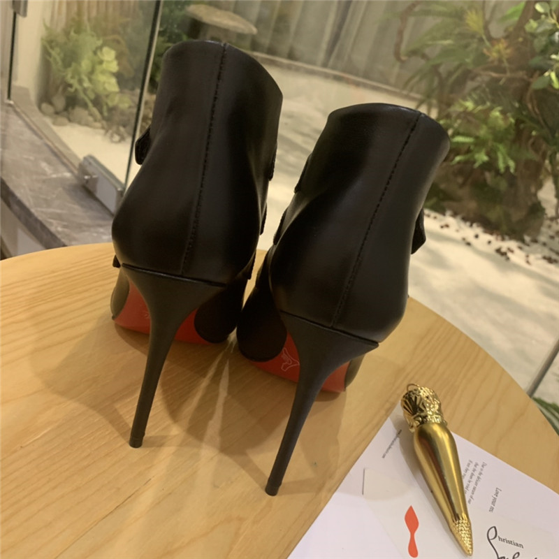 Chr1st1an louboutin black leather triniboot ankle boots