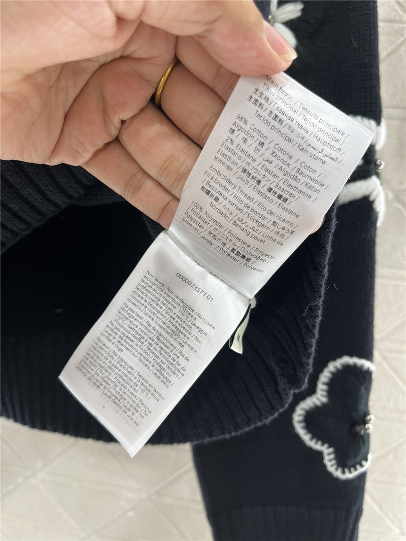 Va1e*ntin0 floral blend knit sweater in black