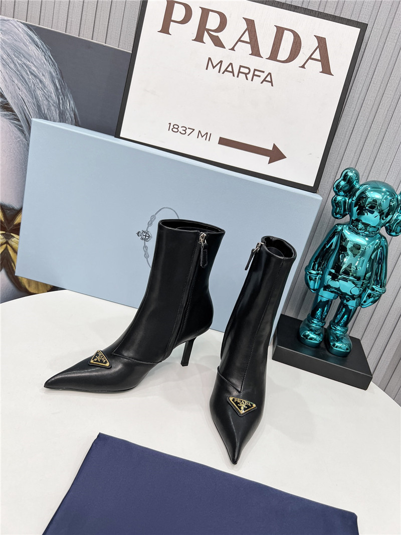 Pra*a black calfskin heeled ankle boots